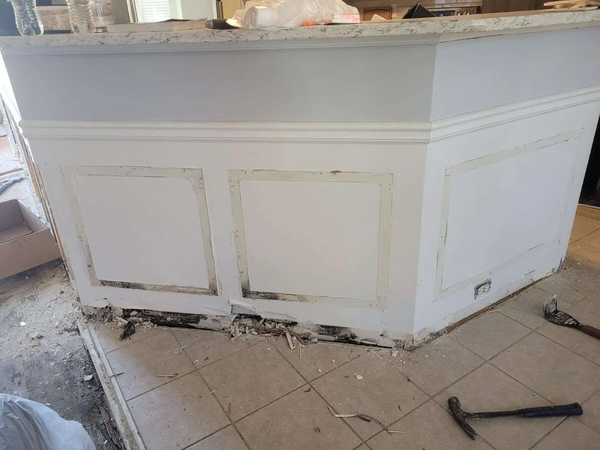 Water damage and mold on kitchen during Sewage Cleanup & Sanitation in Rockport